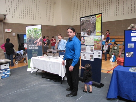 Dressed up man in front of a presentation