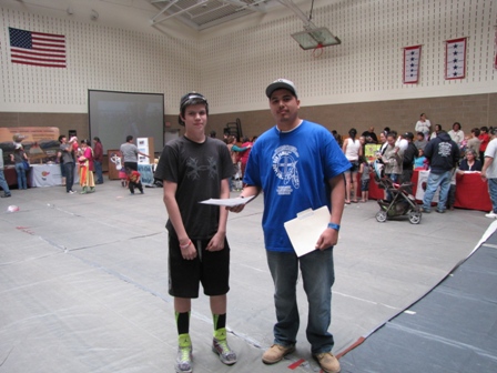 Steve Langdeau awarding Robert Eagle Thunder first place